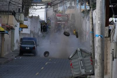 A spike in violence rattles Ecuador as nightclub arson kills 2 and false bomb sparks evacuation