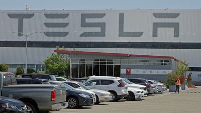 Tesla is raising factory worker pay as auto union tries to organize its electric vehicle plants