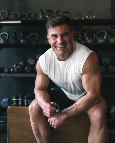 Sophisticated Rob Lipsett Captures Elegance and Charisma in White Ensemble