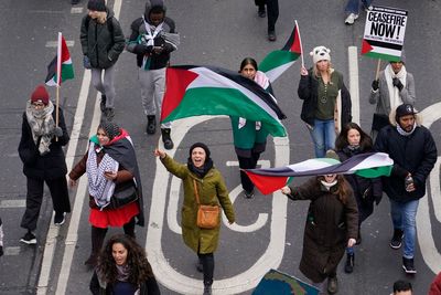 A global day of protests draws thousands in London and other cities in pro-Palestinian marches