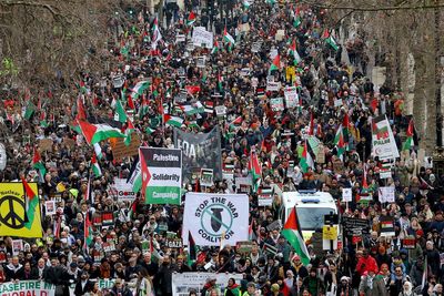 Thousands attend pro-Palestine protest as police warn of crackdown on slogans