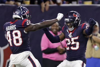 Desmond King II of Texans with helicopter tackle of Joe Flacco