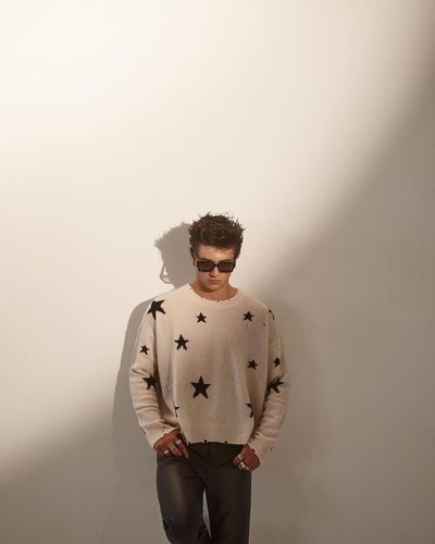 Effortlessly stylish: Asher Ange's fashionable persona captured in pictures