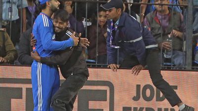 Man detained for breaching security and hugging Virat Kohli during T20 match