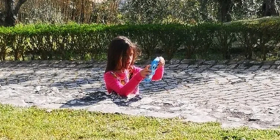 Optical illusion baffles internet as girl appears half-submerged in ground