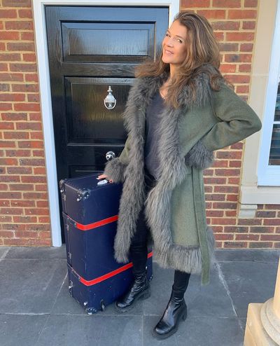 Elegant Annabel Croft Radiates Grace in Stylish Long Coat