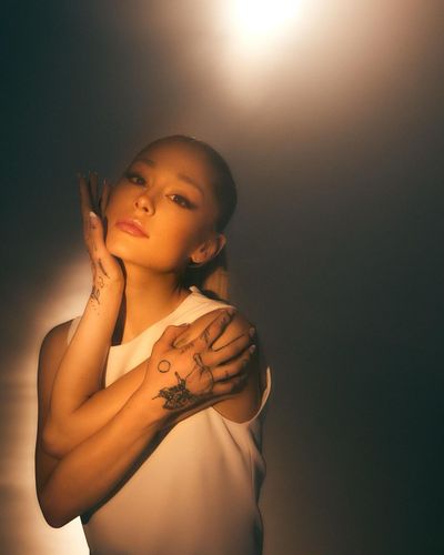 Ariana Grande: Graceful Icon, Striking Poses, Captivating Moments