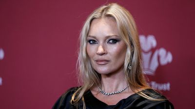 Kate Moss celebrates 50th birthday in see-through black lace gown in Paris