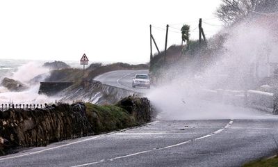 UK weather: severe wind warnings as Storm Isha set to wreak travel chaos