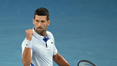 Ruthless Djokovic storms into Open quarter-finals