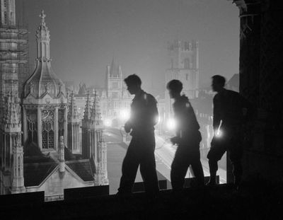‘You can’t climb a building with a tripod’: John Bulmer’s images of the Cambridge night climbers