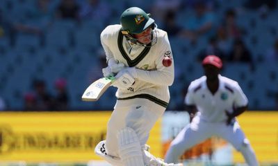Usman Khawaja bloodied by bouncer as Australia crush West Indies in first Test