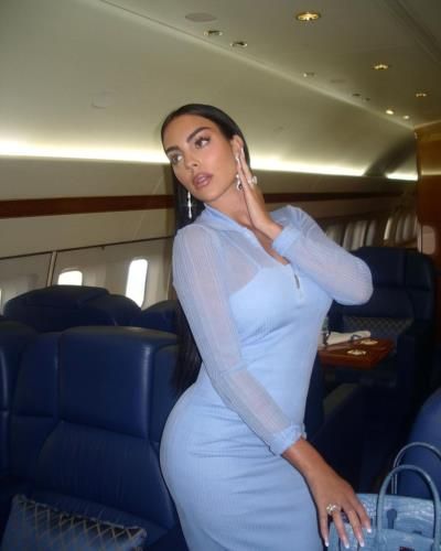 Georgina Rodríguez Soars in Stylish Blue Ensemble Amidst Air Travel