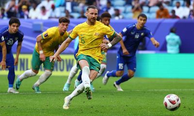Australia pegged back by Uzbekistan but finish top of Asian Cup group