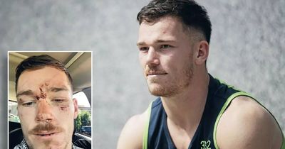 Two police officers charged with assaulting NRL star in bar brawl