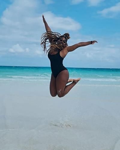 Serena Williams Capturing the Essence of Joy in Mid-Air