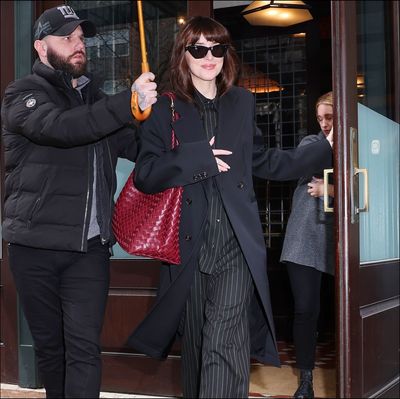 Dakota Johnson's Pinstripe Power Suit Flips the 'Mob Wife' Trend on Its Head