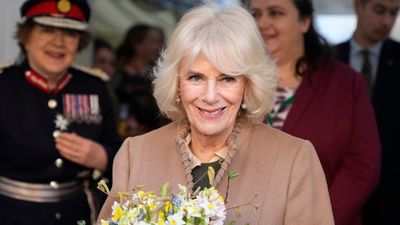 Queen Camilla's mismatched earrings are right on trend as she takes 'playful approach' to jewellery