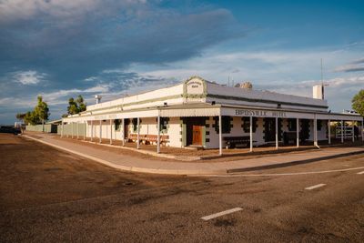 Queensland town within 0.1C of state’s record temperature as Australia swelters under heatwave