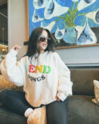 Becky G: Stylish Pose and Musical Hints Ignite Excitement