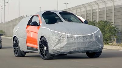 This Lamborghini Urus Prototype Is Wearing The Freakiest Camo We've Ever Seen
