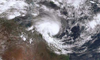 ‘Like a ghost howling’: ex-Tropical Cyclone Kirrily to bring heavy rain to Queensland as Townsville residents survey damage