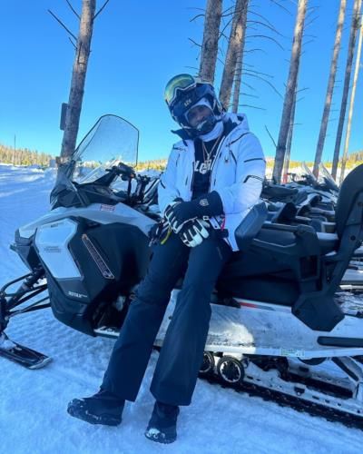 Deion Sanders: Embracing Winter's Coolness on a Snowmobile Adventure