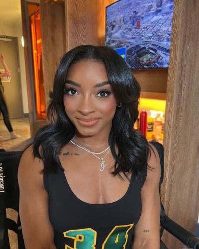 Simone Biles Stuns in Elegant Black Ensemble and Statement Necklace