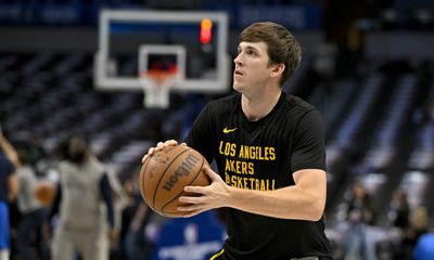 Watch: Austin Reaves gives his sneakers to a young fan