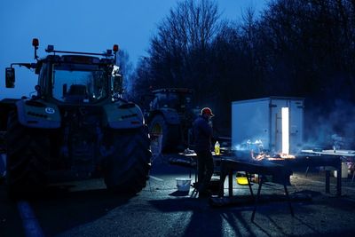 French Farmers Keep Up Roadblock Protests To Pressure Government