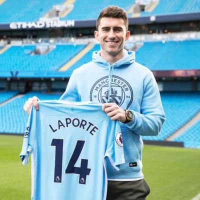 Aymeric Laporte Celebrates Signing with Manchester City in 2018