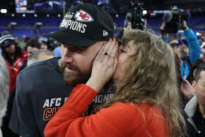 Taylor Swift whispering to Travis Kelce after the Chiefs clinched a Super Bowl berth became a meme