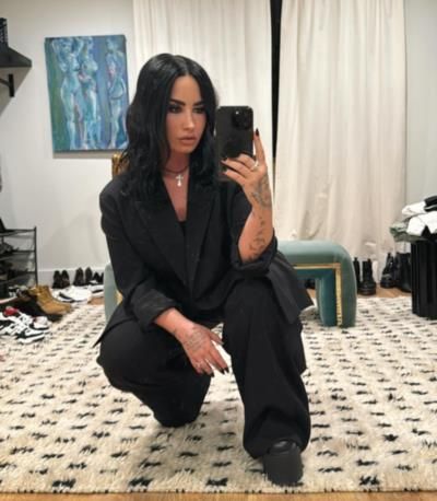 Demi Lovato shines in a striking black ensemble photoshoot