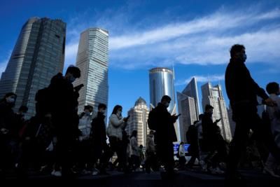 IMF Warns of China Risk, Revises Up Asia's Growth Forecast