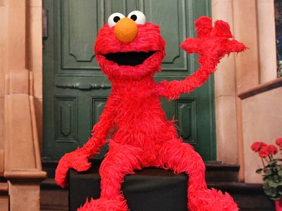 Elmo takes a turn as a therapist after asking, 'How is everybody doing?'