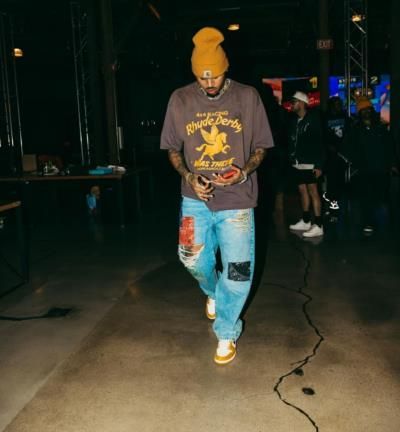 Chris Brown's Effortlessly Cool and Dapper Style Shines in Candid Shot