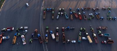 Defiant French Farmers Stick To Barricades