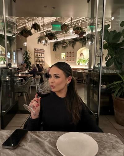 Janel Parrish finds serenity with a glass of wine
