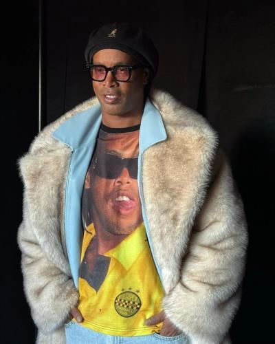 Ronaldinho Shines in Stylish Photoshoot: Soccer Icon's Cool Outfit