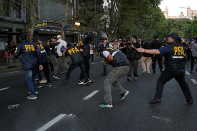 Argentine Police Battle Protesters Opposed To Sweeping Reform Bill