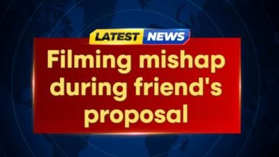 Woman misses friend's proposal while distracted by a raccoon video