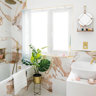 This homeowner saved £1000s using ‘faux’ marble tiles in this luxury Versace-inspired bathroom makeover