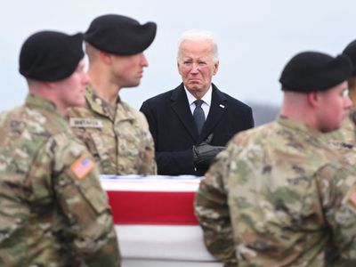 Biden attends the dignified transfer at Dover for service members killed in Jordan