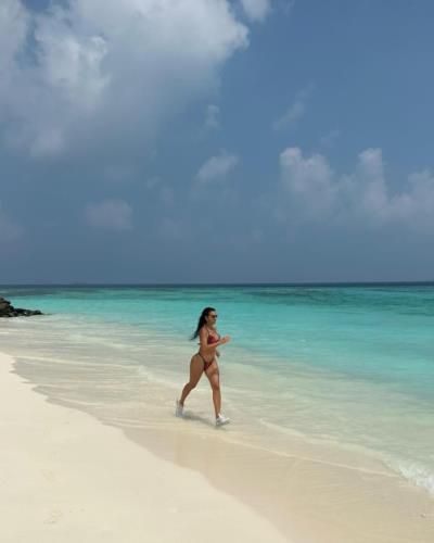 Georgina Rodríguez's Beach Adventures: Joy, Family, and Elegance