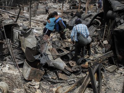 Forest fires raging in central Chile have killed more than 100 people