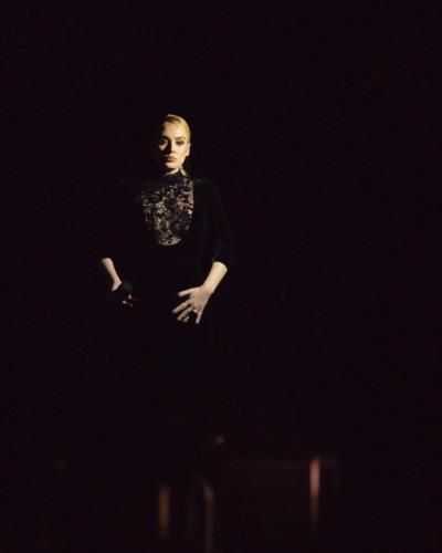 Adele's Night of Musical Enchantment in Elegant Black Dress