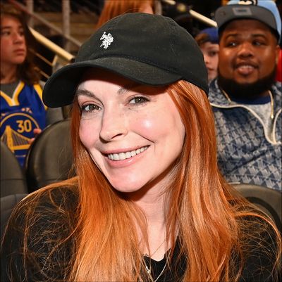 Lindsay Lohan Shines in Chic Athleisure Wear While Hanging Out With Stephen Curry Courtside