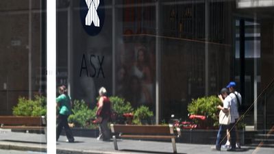 Aust shares sink as Fed chair says no quick rate cuts
