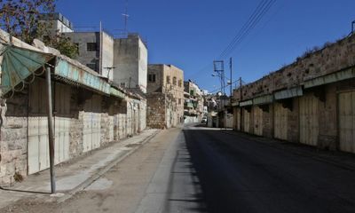 ‘Feels like revenge’: Palestinians on life locked down in Hebron’s Old City