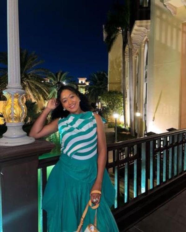Elegant Naomi Osaka Embracing Tranquility Under Starlit Night Sky